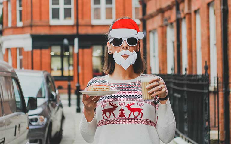 girl wearing holiday glasses